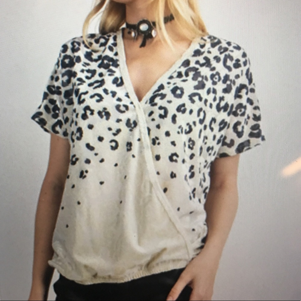 Brand new Vocal Ivory animal print top